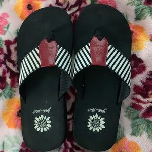 Yellow box flip flops